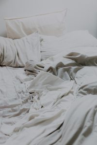 bed - white pillows and comforter