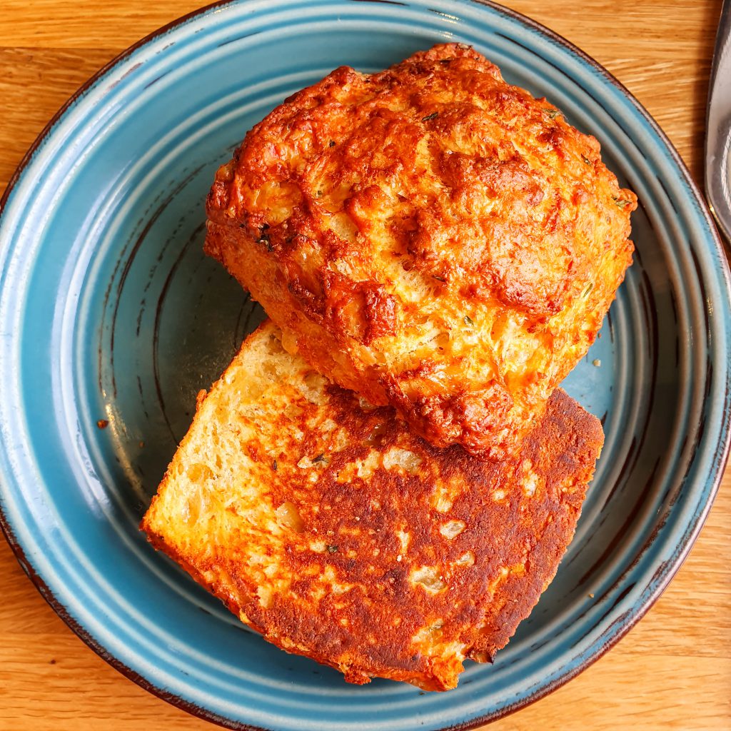 cheese scone on a blue plate