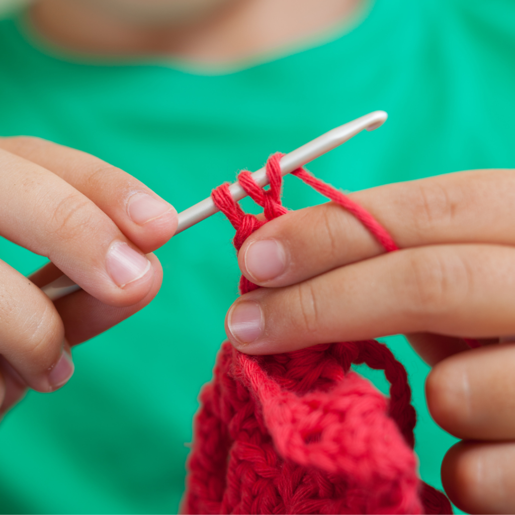 close up of hands crocheting mindfulness and boundaries